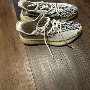 Yeezy Athletic Shoes in Black, White, and Cream